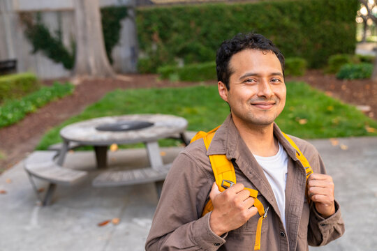 portrait of confident man with backpack