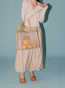 Mesh Tote Bag With Groceries And Summer Outfit