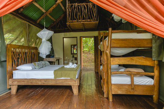 Eco-lodge bedroom offering rustic jungle accommodation
