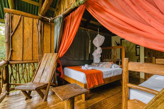 Rustic treehouse bedroom with a natural wooden aesthetic