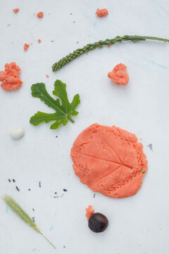 Colored dough and leaves