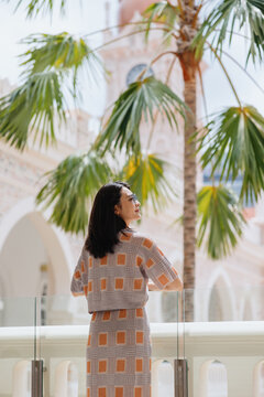 Woman sightseeing at Sultan Abdul Samad Building in Kuala Lumpur