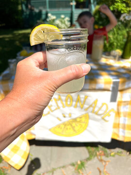 POV view of lemonade stand customer