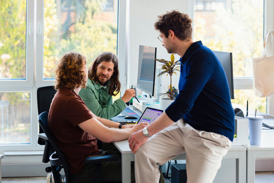 Colleagues Collaborating in Casual Office Business Meeting