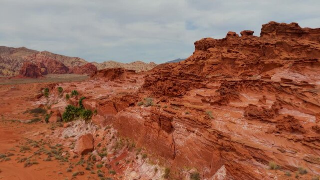 Aerial Little Finland Red Sandstone Formations and Desert Vegetation Fly Through