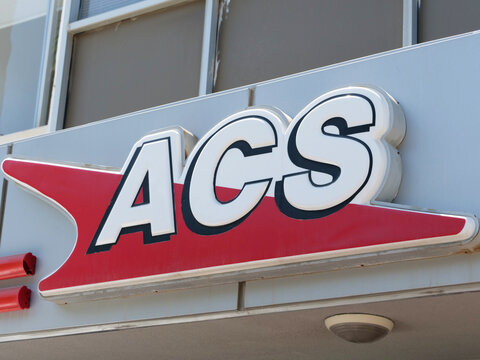 Greece, Rhodes, August 17. 2026, official outdoor storefront signage and logo of the postal delivery company ACS