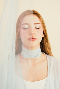 Woman with closed eyes veiled i