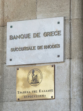 Greece, Rhodos, August 17. 2026, bank of greece, front view of the central bank building Trapeza tis Ellados with Greek and English lettering