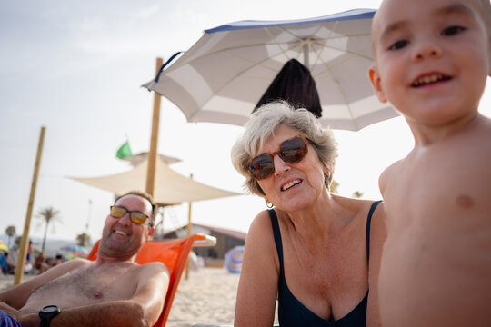 Multi generational family enjoying summer vacation
