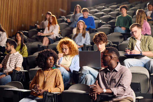 Students sitting in a Large Auditorium