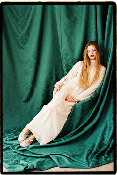 Woman posing in elegant vintage dress 