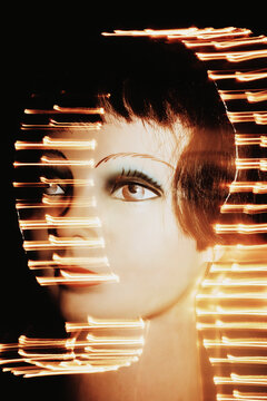 Mannequin Head With Moving Lights at Nighttime