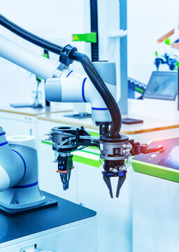 automatic gripping and smart robot working on smart factory,industry 4.0 and technology.