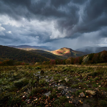 Dramatic storm clouds and rain shafts over rolling autumn hills, with spot sunlight illuminating colorful forest slopes on a misty mountain vista