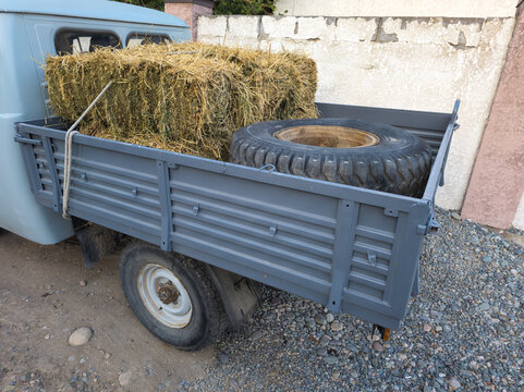 Pickup Truck Bed with Hay Bale and Spare Tire