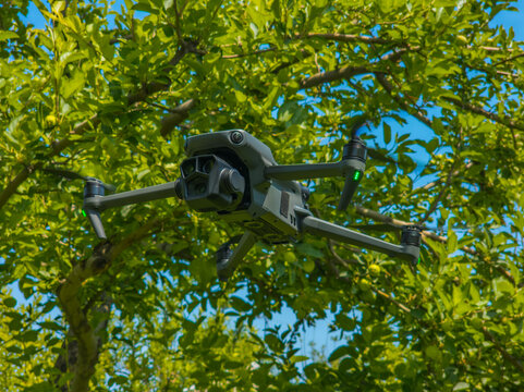 Drone Hovering Near Green Leaves in Kyrgyzstan