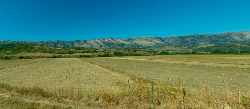 Panoramic Farmland and Mountain Range Near Vlora