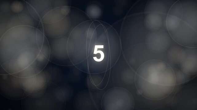 Countdown timer from nine to zero with atomic orbits in dark background representing science and technology or for new year timer
