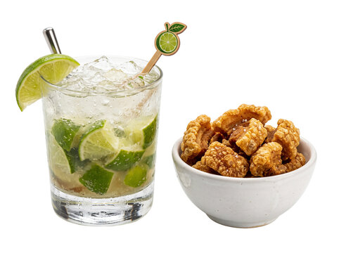 Caipirinha cocktail with lime and pork rinds in a bowl PNG Isolated on transparent background