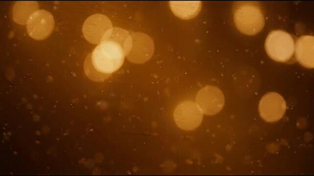 Soft honey-colored light circles in honey and amber tones, light leak overlay ideal for optimism branding, motion graphics design projects