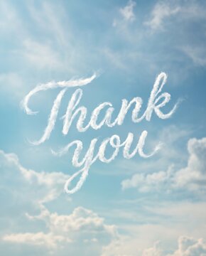Thank you message written in white clouds across blue sky