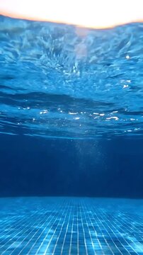 Water Bubbles Rising From a Swimming Pool Floor with a Grid Pattern, Creating an Underwater Motion Graphics Loop.