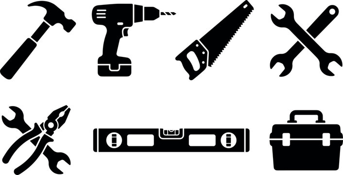 Collection of black silhouette tools including a hammer drill saw and wrenches on a white background