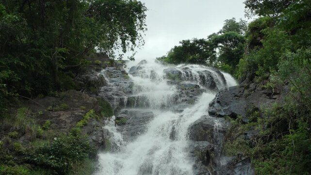 Beautiful waterfall flowing through lush nature. Freshwater sustains life and ecosystems while highlighting water conservation biodiversity and environmental protection for a sustainable future.

