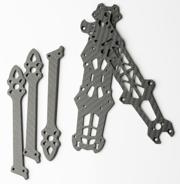Parts for building a model drone on a white surface
