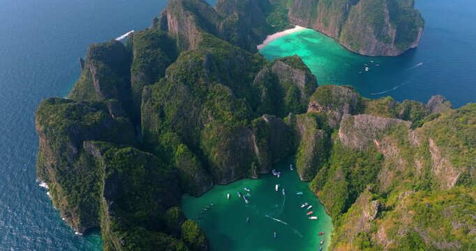 Aerial Drone View of Maya Bay and Pi Leh Bay &ndash; Thailand Tropical Island Landscape with Limestone Cliffs