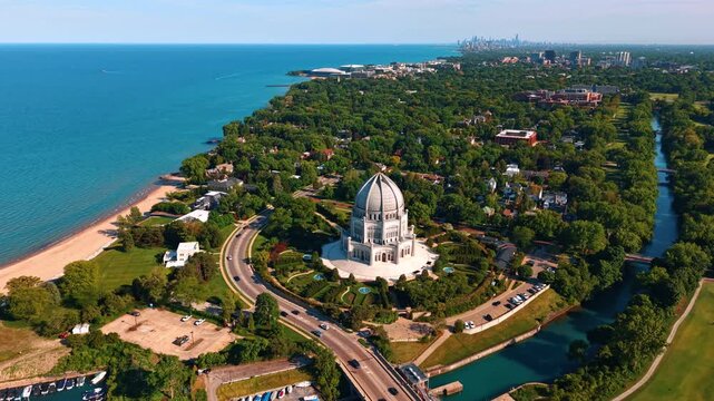 Approaching the stunning white temple surrounded by lush green gardens. Bah&aacute;'&iacute; House of Worship in Wilmette, Illinois, USA on the shore of Lake Michigan.