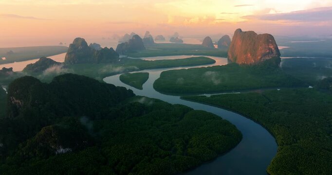 Thailand Golden Sunrise Over Ao Phang Nga National Park with Majestic Karst Mountains and Calm Sea