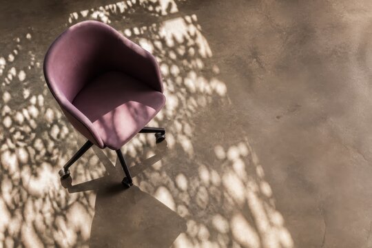 Dappled purple chair in modern interior with dramatic shadow