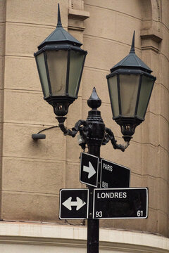 The famous corner of Paris Street and London Street in Santiago, Chile. Street signs alongside the streetlamp
