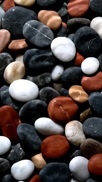 River Stones Shifting and Swirling in a Seamless Looping Animation. Smooth Pebbles, Water Texture, Natural Background.
