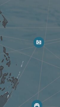 Animation of network of digital icons over spinning globe against blue background