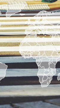 Crossing street, people with world map animation overlay