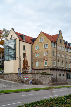 Stuttgart, Germany - November 11 2024: Historic Arcotel Camino hotel building with traditional sandstone architecture and modern glass extension along a city street in central Stuttgart.