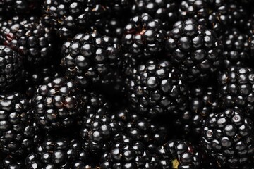 Heap of ripe tasty blackberries as background, closeup © New Africa