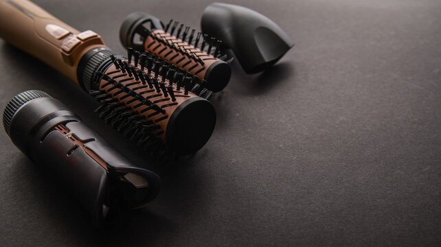 Professional hot air brush set with interchangeable barrels for versatile styling