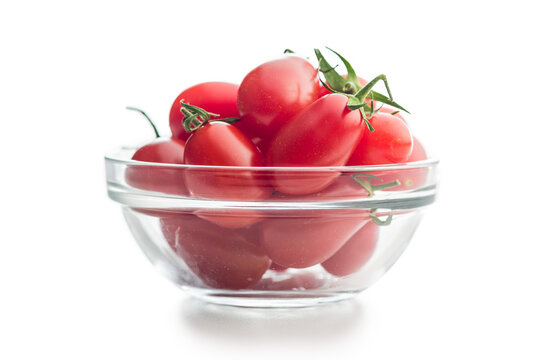 Fresh Red Cherry Tomatoes in a Clear Glass Bowl on White Background for Cooking
