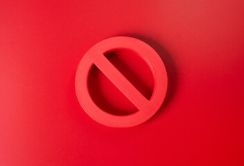 Obraz premium Prohibition symbol on a red background. Sanctions and restrictions concept. Cancellation, refusal and a total ban represent blocked access and strict limitations.