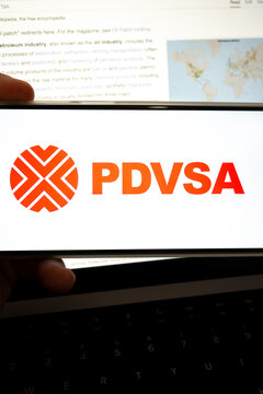 Pdvsa logo appearing on handheld device petroleum industry info