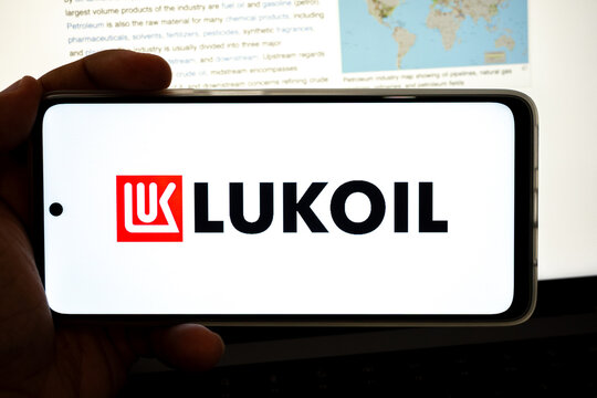 Holding device showing lukoil logo with petroleum industry information