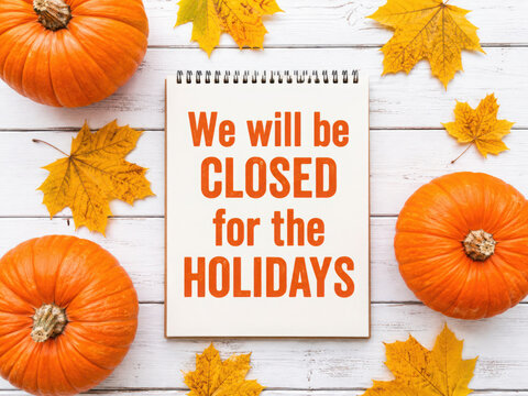 We will be closed on the Holidays. Close-up, view from above, no people. Congratulations for loved ones, relatives, friends and colleagues. Holiday concept