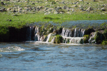 Clear stream cascading over a rocky ledge, Orkhon Valley, Mongolia © 由季 中山