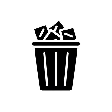 Black trash can icon with paper waste
