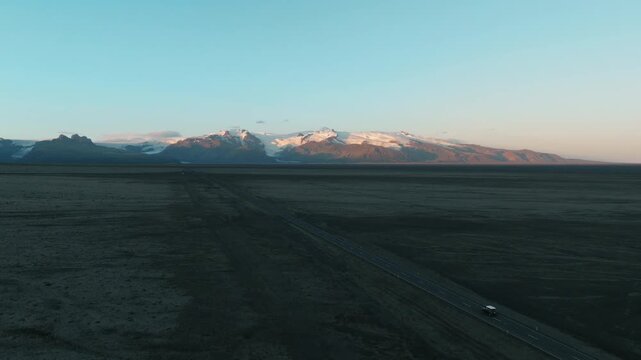 Vast Black Sand Plain Toward Distant Snowy Mountains, Iceland