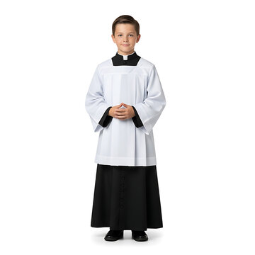A young boy stands in a formal cassock and surplice, dressed for a religious ceremony, embodying reverence and tradition.