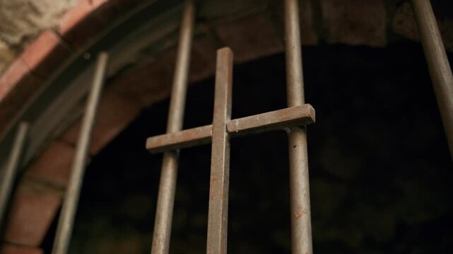 Christian crucifix at the entrance to the catacombs of ancient sanctuary Naples